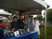 The whole team on Sunday evening, with our display and calculators.