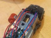 Carving out a space above the front worm gear for the capacitor