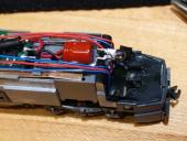 Capacitor snugly fitted into new space