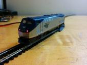 Final view: oblique front, front tail lights on